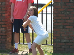 Girl playing baseball