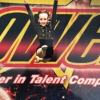 dance team member competing at a competition