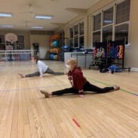 Custom Dance Classes - Girls doing splits with Masks